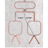 Fig. 8 A single section of a 16-way power divider with 50 ohm/sq PRT resistors